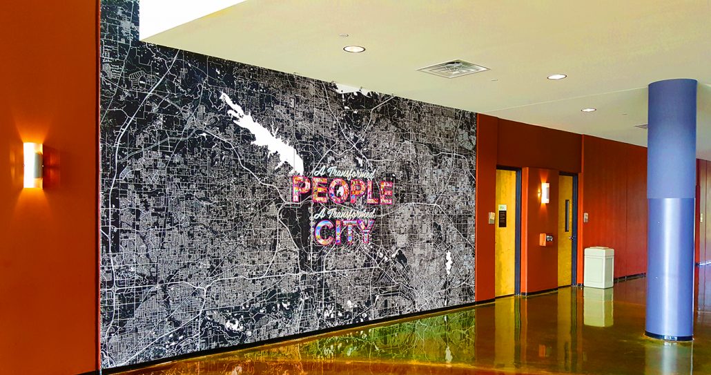 Large format wall mural installed in a branded interior space